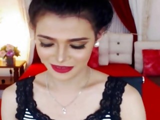 Beautiful transsexual does a striptease show on camera