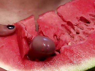 Lovely shemale pounds a watermelon so hard that she cumshots